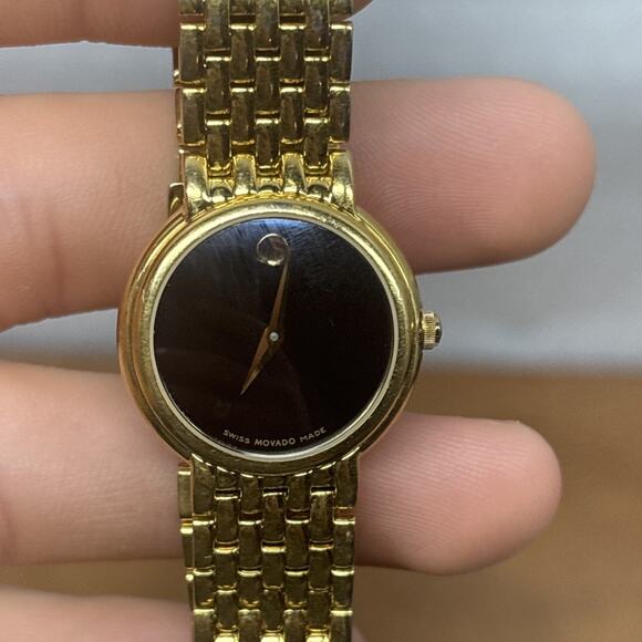 Movado Ladies Watch Gold Tone with Black Dial 28mm Case Excellent!